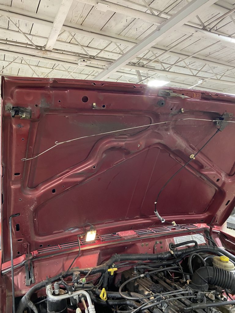 Hood Latch Rod Hanging Down